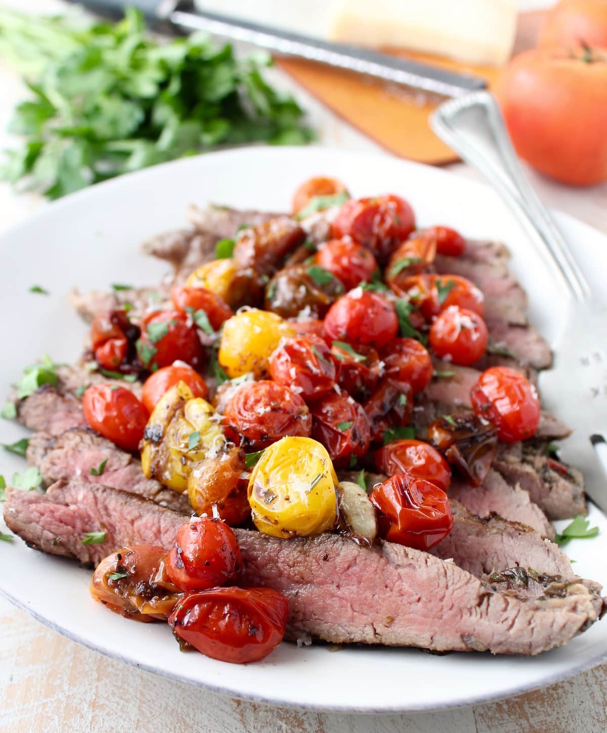 Slow Cooker Flank Steak and Peppers - Deliciously Seasoned