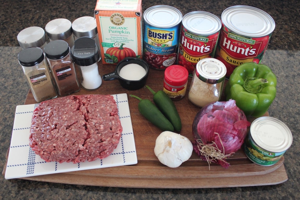 Pumpkin Chili Ingredients on a wooden cutting board. 