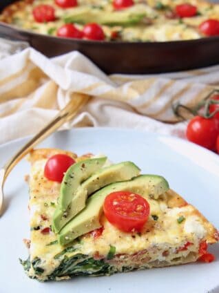 Slice of frittata on plate