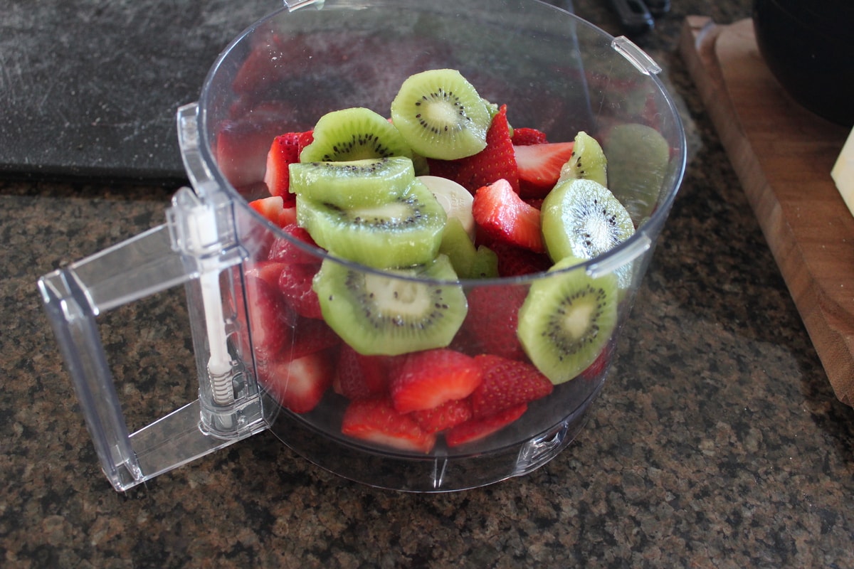 Fresh strawberries and kiwi in a Food Processor