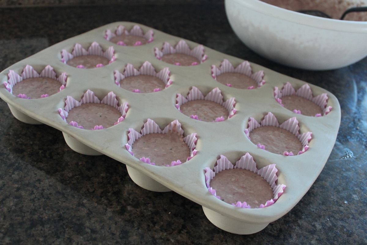 unbaked Strawberry Kiwi Cupcakes in a muffin pan