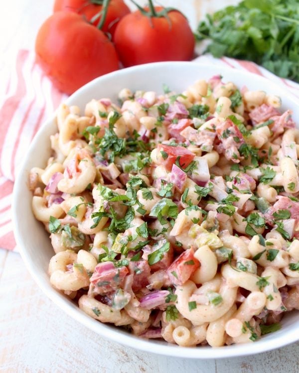 Spicy macaroni salad with diced jalapenos, tomatoes and onions