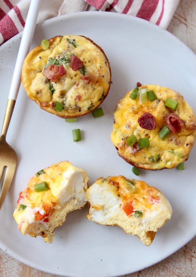 egg muffins on white plate with fork