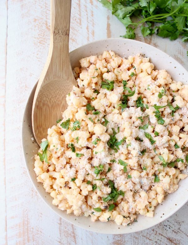 Deconstructed Mexican Street Corn combines grilled corn "off the cob", cilantro, sour cream, lime juice & parmesan cheese for an amazingly flavorful side dish recipe!