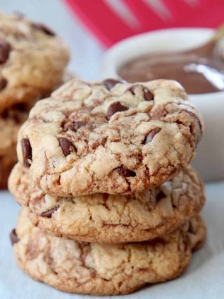 Three stacked nutella chocolate chip cookies