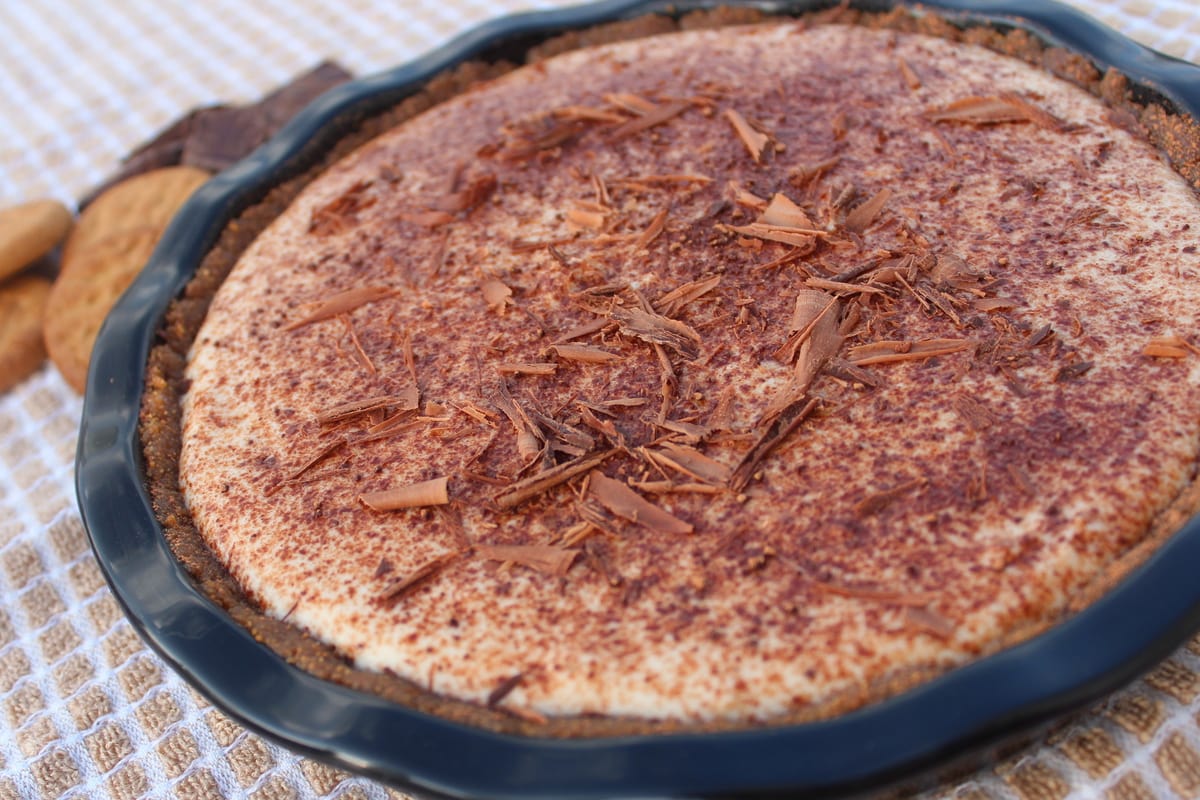 prepared tiramisu tart topped with chocolate shavings