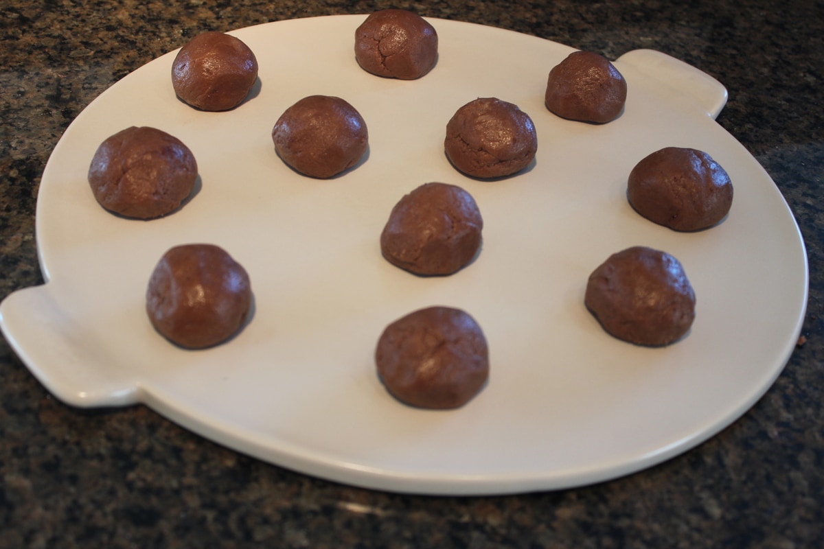 Chocolate Cookie dough balls on a baking stone