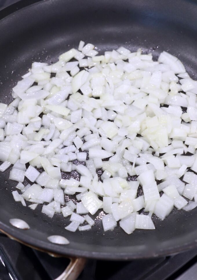 diced onions in skillet
