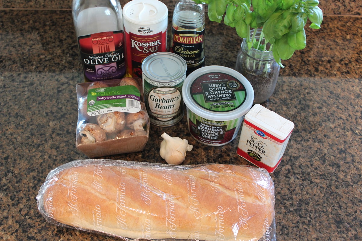 Mushroom Chickpea Bruschetta Ingredients on a granite countertop