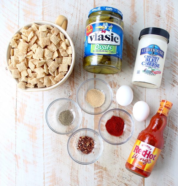 Pickle Chips are dipped in buffalo sauce, then rolled in a spicy Rice Chex mixture and baked golden brown for the perfect gluten-free & vegetarian snack!