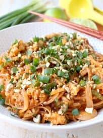 Spicy Vegetable Pad Thai is gluten free, vegetarian & given a spicy kick from the red curry paste, Sriracha & sliced jalapeños! This recipe is totally delicious & made in just 15 minutes!