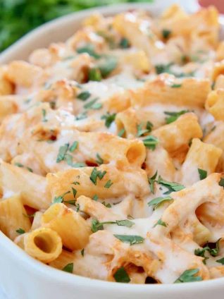 Cheesy baked pasta in casserole dish