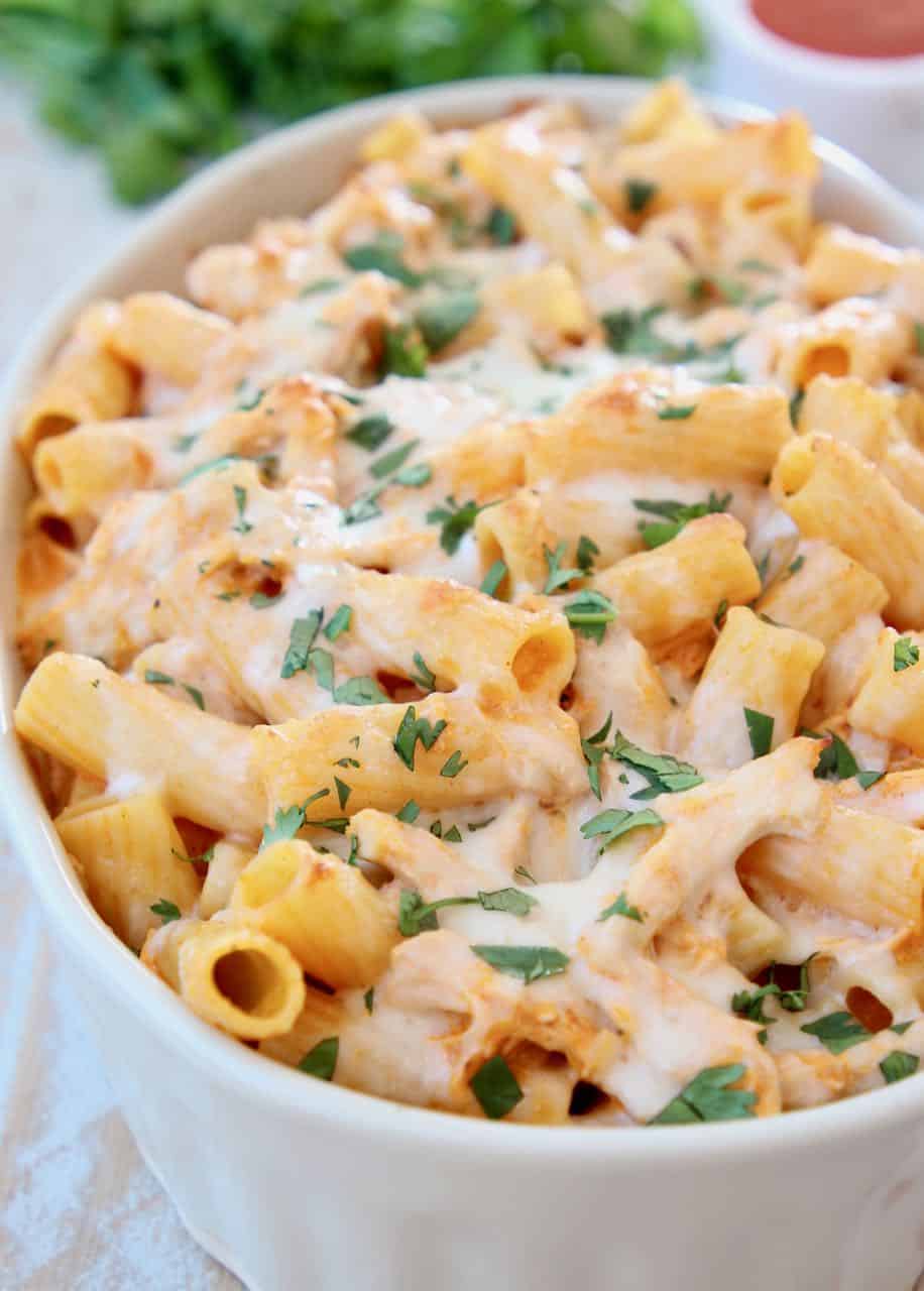 Baked rigatoni with cheese in casserole dish
