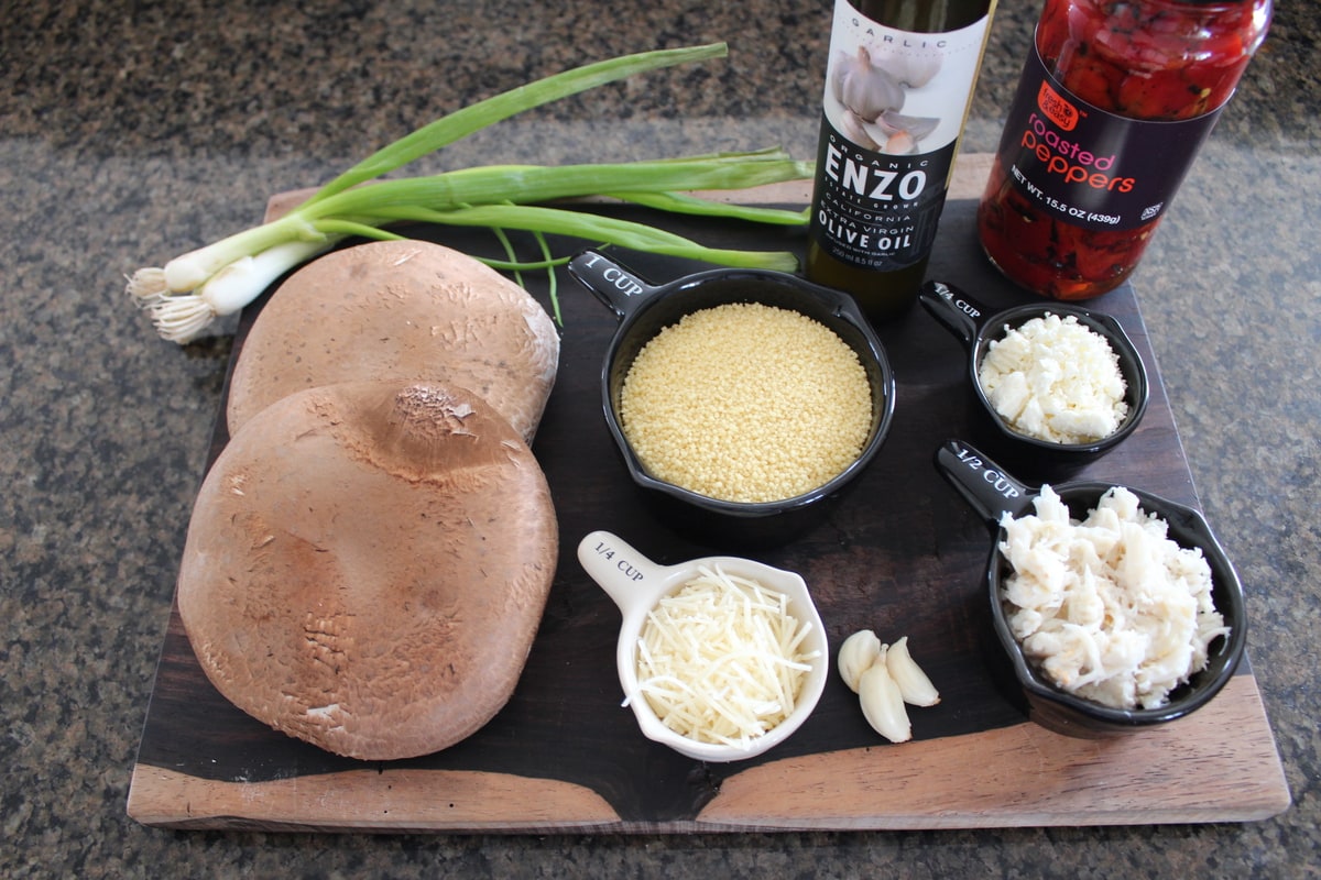 Crab Couscous Stuffed Mushroom Ingredients on a wood board