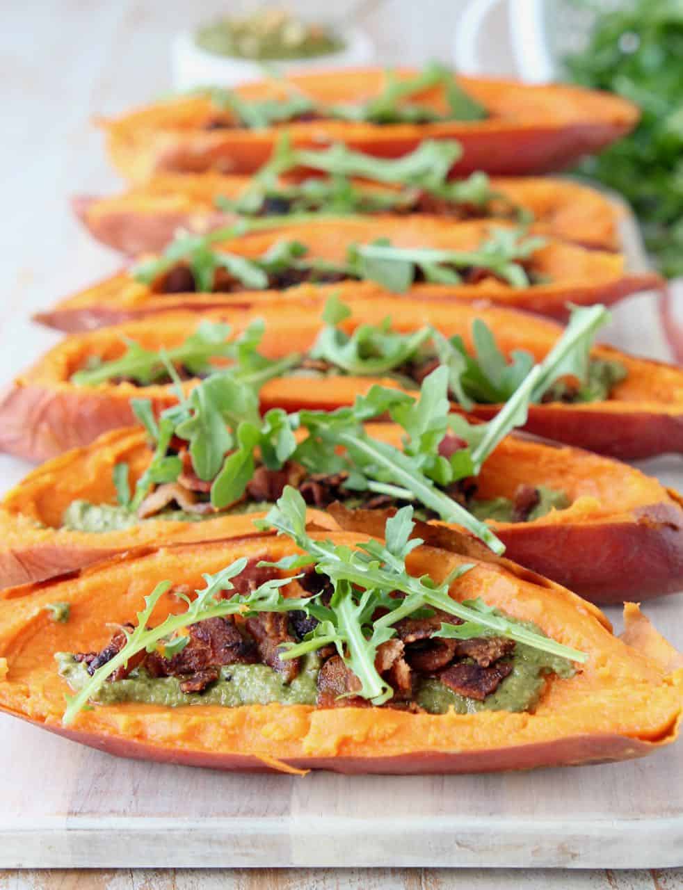 Loaded sweet potato skins on wood serving tray