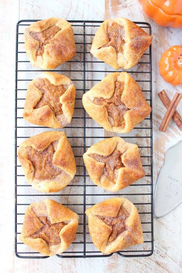 pumpkin filled pastries on wire rack