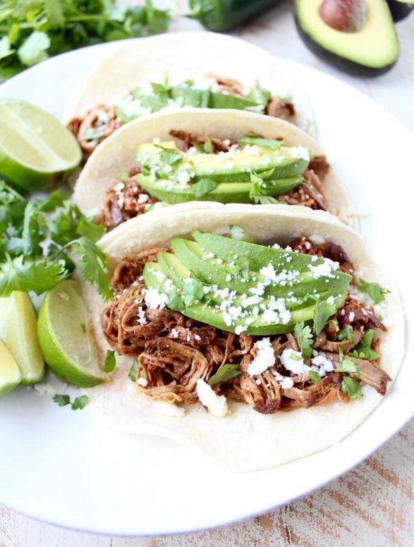 Slow Cooker Pulled Pork Tenderloin Chipotle Honey Tacos are a delicious and easy meal, perfect for weeknight dinners, game day or Taco Tuesday!