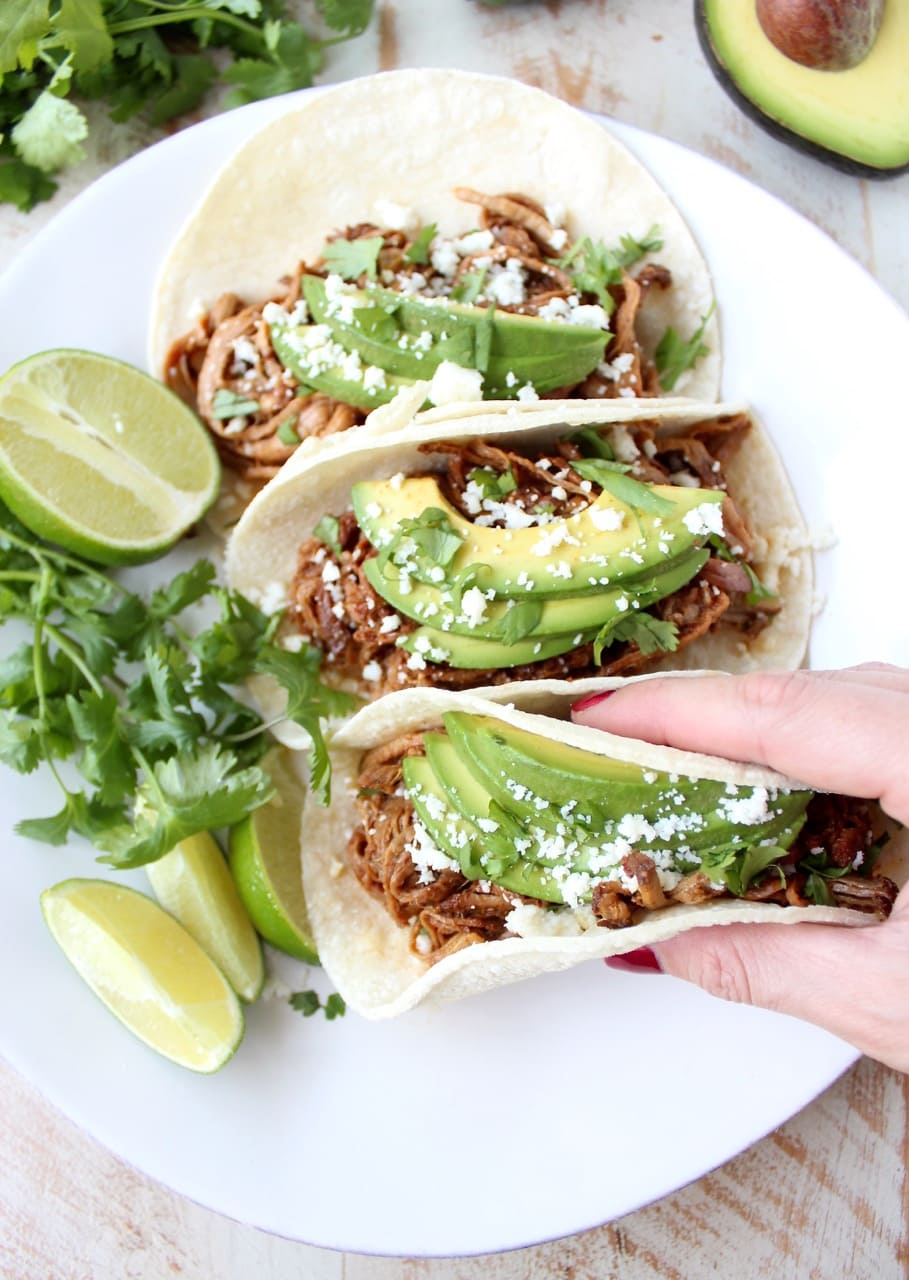 Slow Cooker Pulled Pork Tenderloin Chipotle Honey Tacos are a delicious and easy meal, perfect for weeknight dinners, game day or Taco Tuesday!