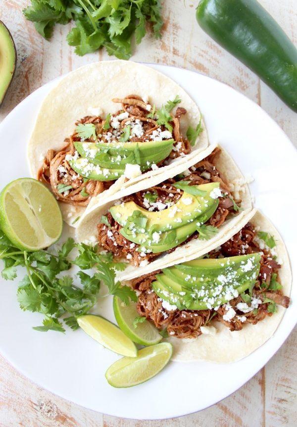 Slow Cooker Pulled Pork Tenderloin Chipotle Honey Tacos are a delicious and easy meal, perfect for weeknight dinners, game day or Taco Tuesday!