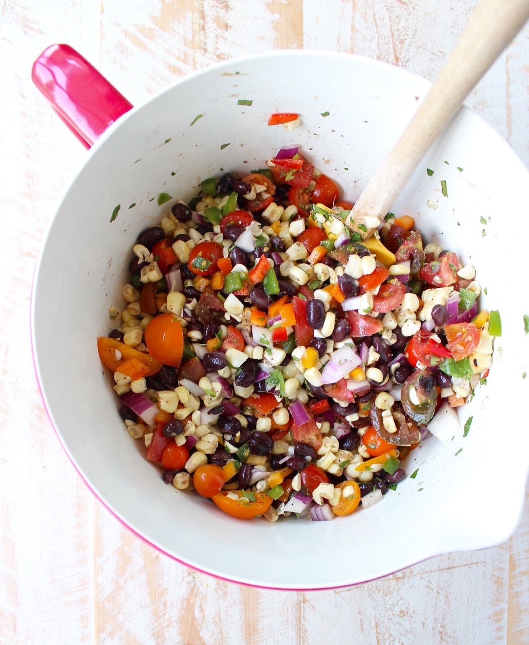 black bean corn relish in large mixing bowl with spatula