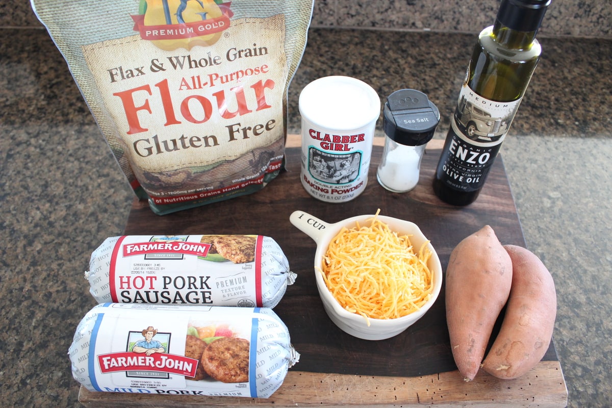 Gluten Free Sausage Ball Ingredients on a wooden board. 