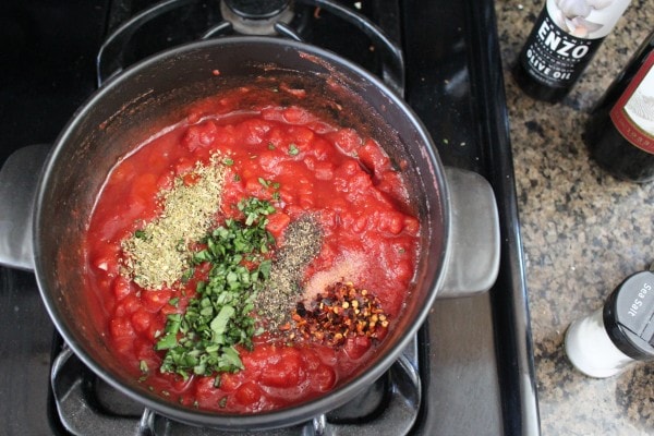 Red Wine Tomato Sauce in a pot on the stove.