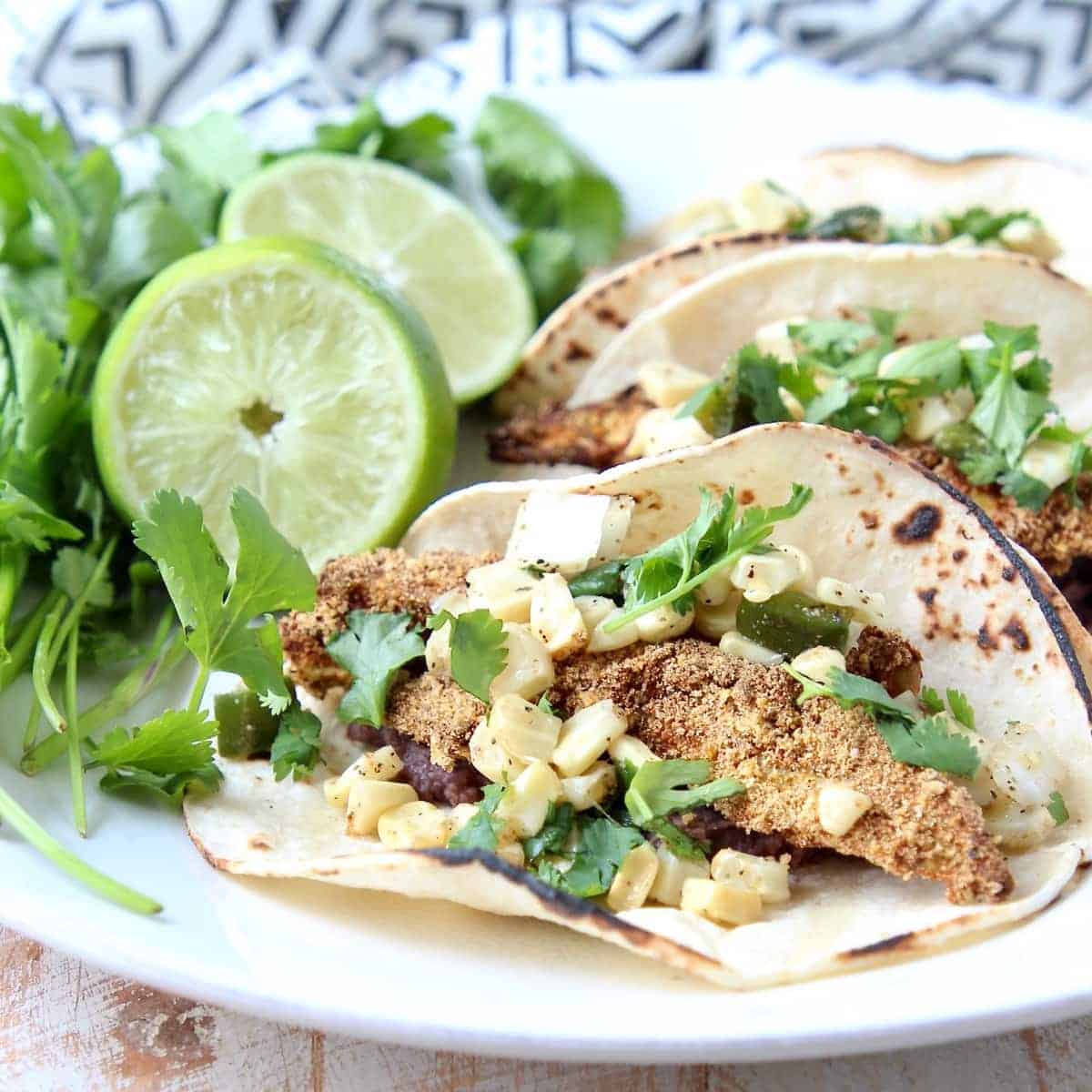 Crispy avocado in tortillas with corn salsa and cilantro