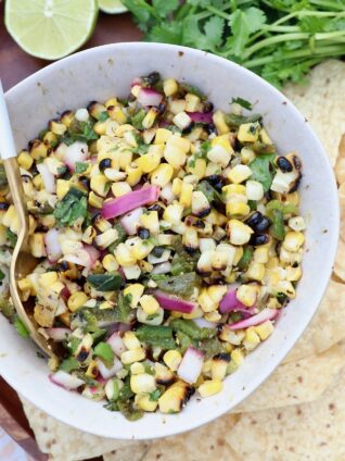 corn salsa in bowl with spoon