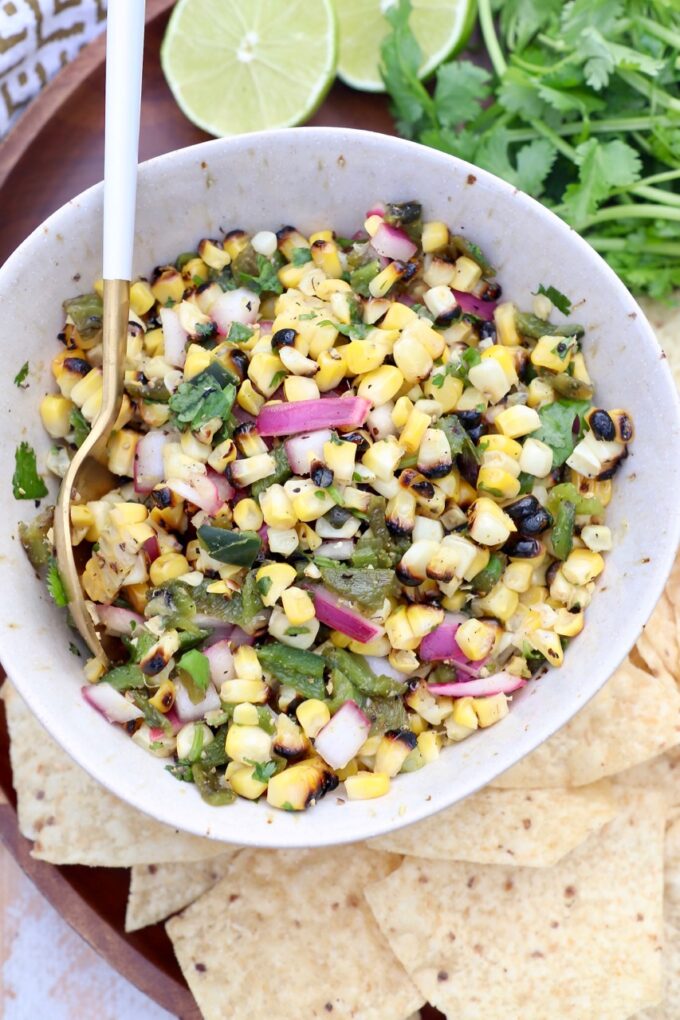 corn and pepper salsa in bowl with spoon
