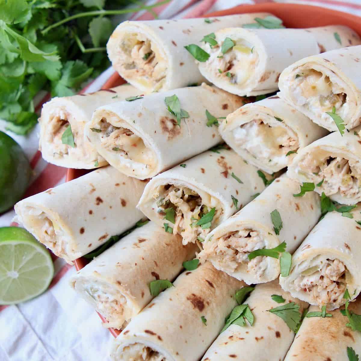 Cheesy Green Chili Chicken Rolled Tacos - WhitneyBond.com