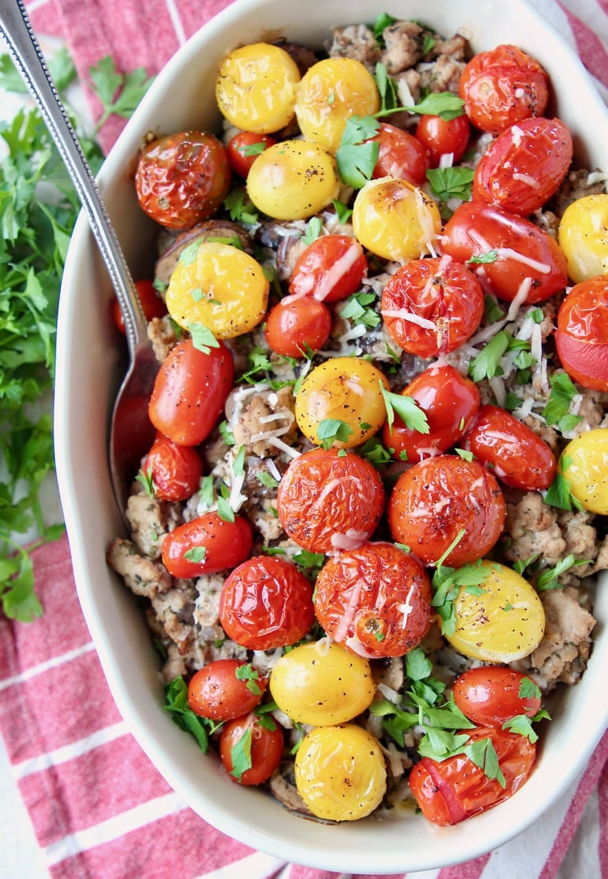 Turkey casserole topped with roasted cherry tomatoes