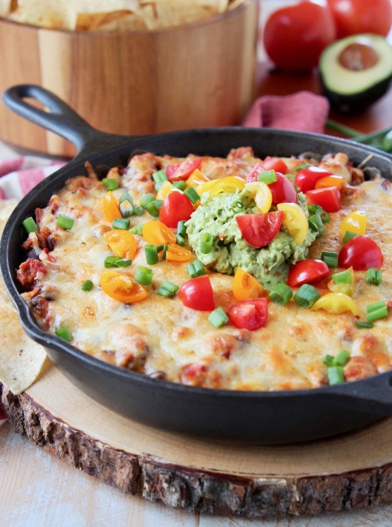 The Best Baked Taco Dip Recipe (and VIDEO) - WhitneyBond.com