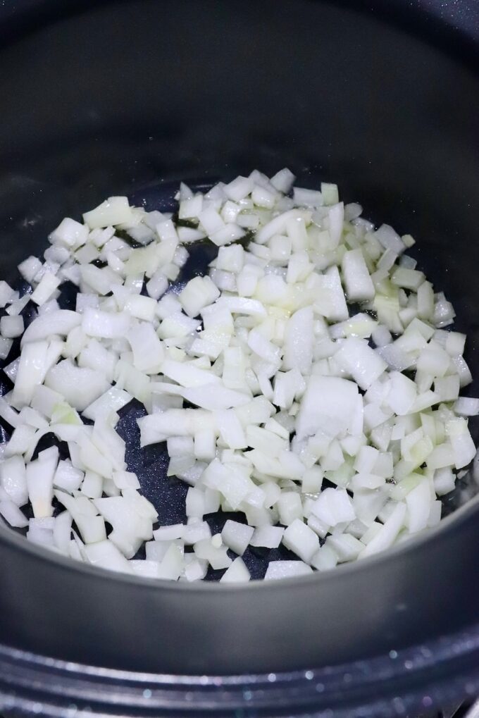 diced onions in a pot