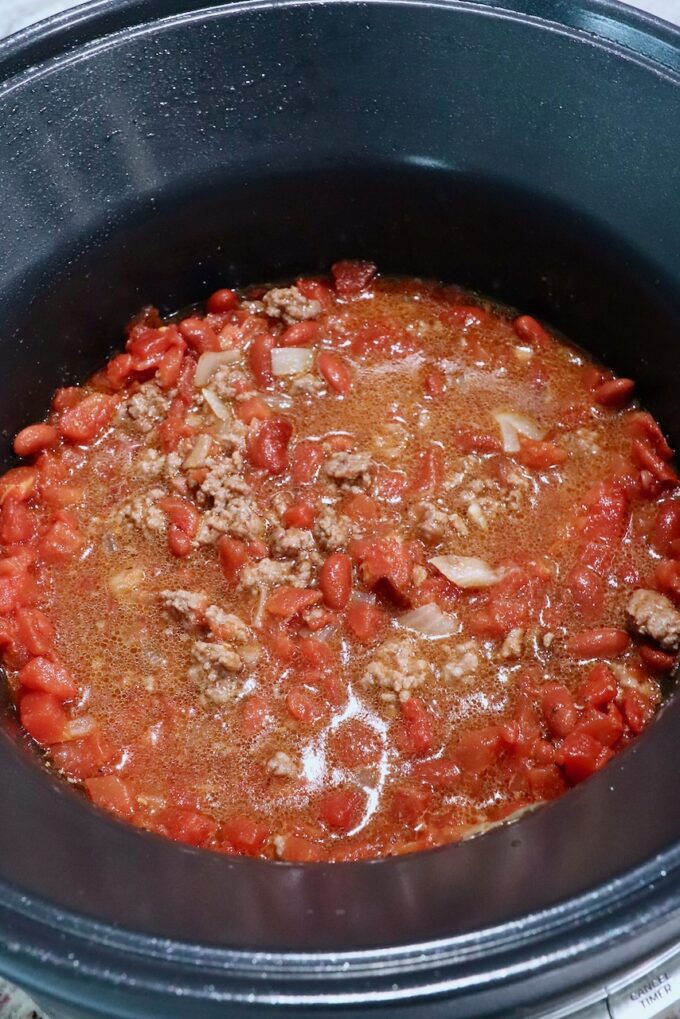 ingredients for chili mixed together in a pot