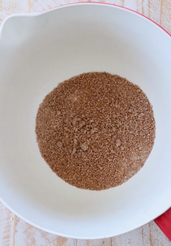 sugar and pumpkin pie spice in mixing bowl