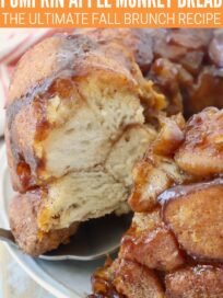 monkey bread on plate with slice on serving spatula