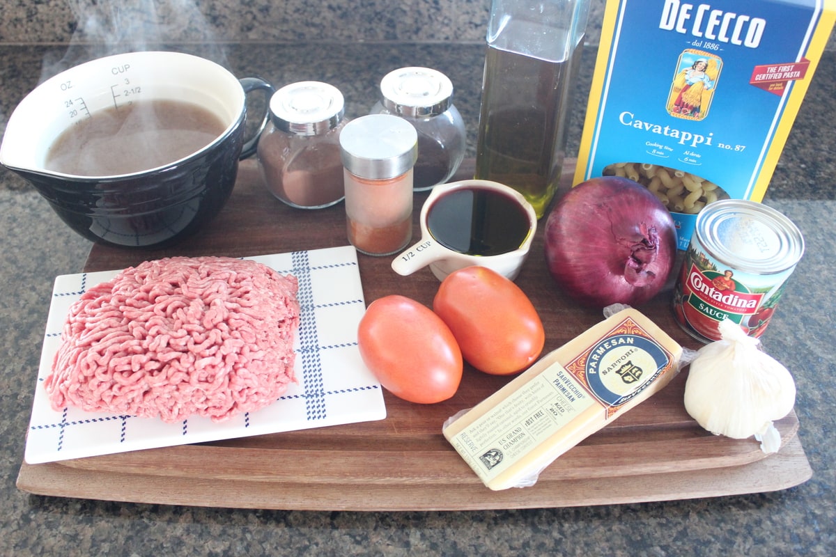 Mediterranean Spiced Beef and Macaroni Ingredients on a wood board