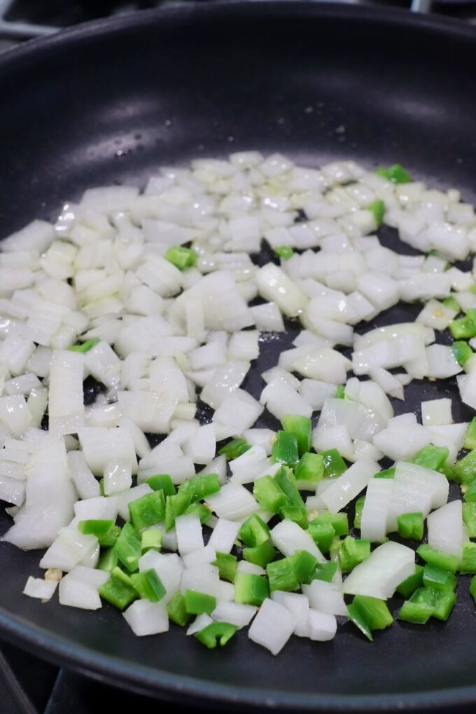 diced onions and jalapenos in skillet