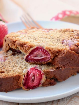 Slices of strawberry banana bread on top of each other