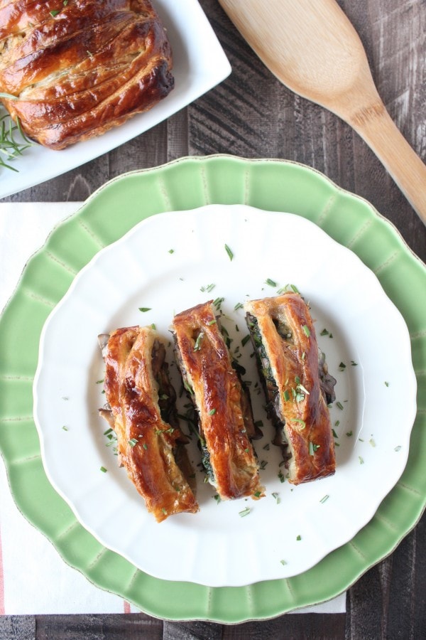 This vegetarian spinach puff pastry recipe is filled with sauteed mushrooms, spinach, and cheddar cheese. Perfect as an appetizer or meatless Monday dinner!