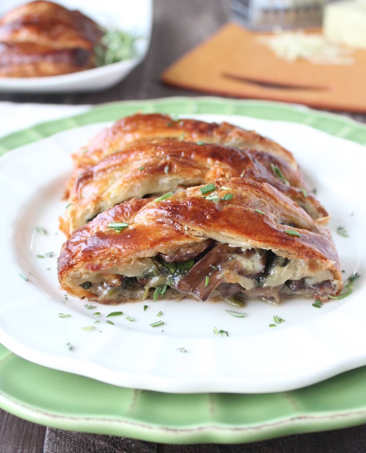 slices of mushroom spinach puff pastry on plate