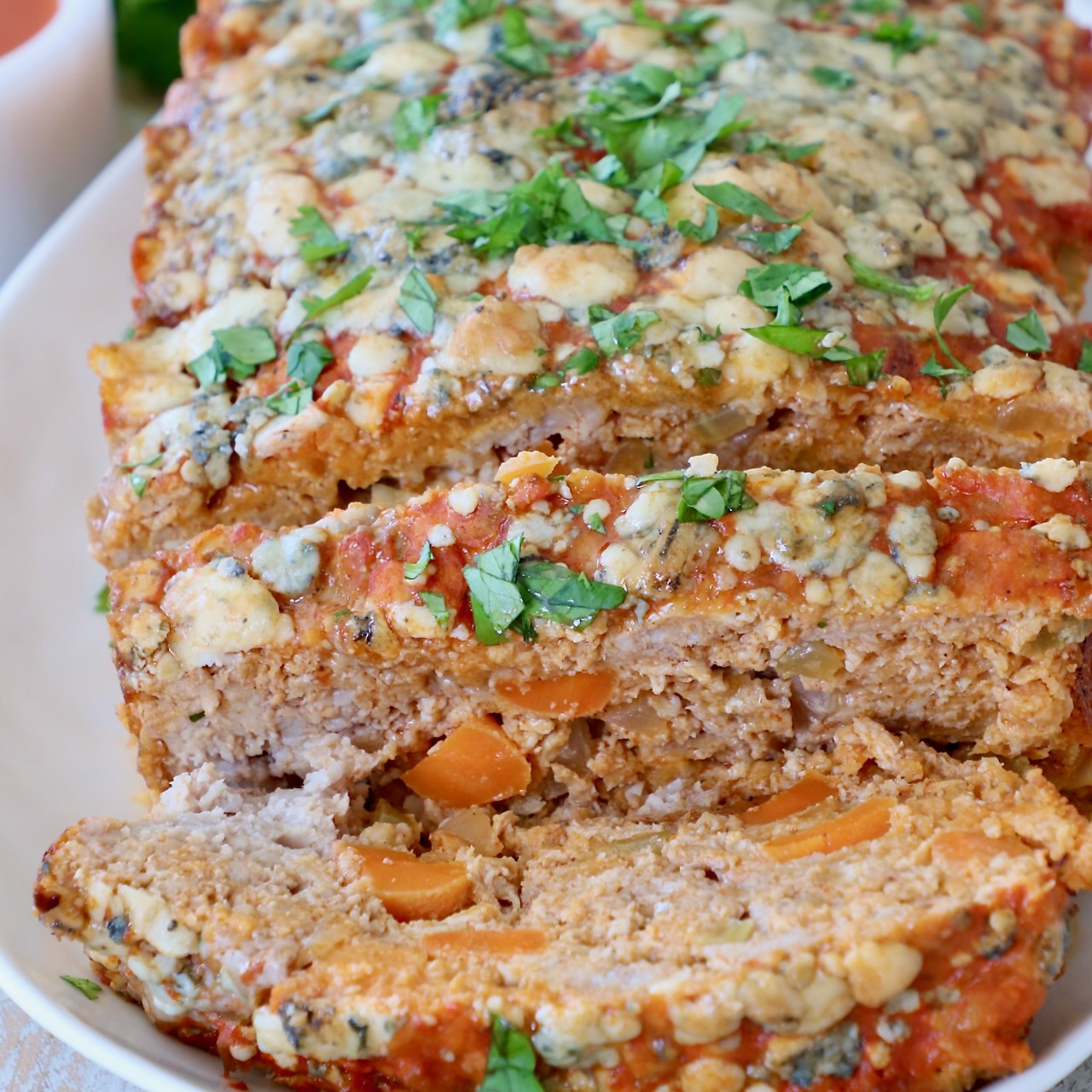 sliced buffalo chicken meatloaf on plate