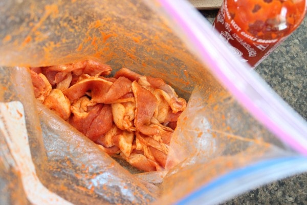 bacon in zipper bag tossed with sriracha and brown sugar