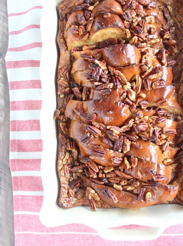Salted Caramel Praline French Toast in a white casserole dish.