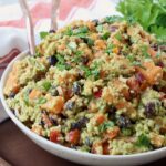 sweet potato salad in bowl with forks