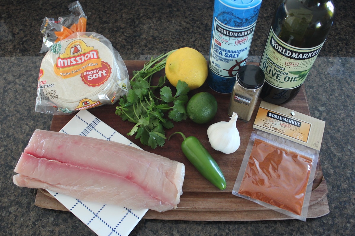 Mahi Mahi Fish Tacos Ingredients on a wood board