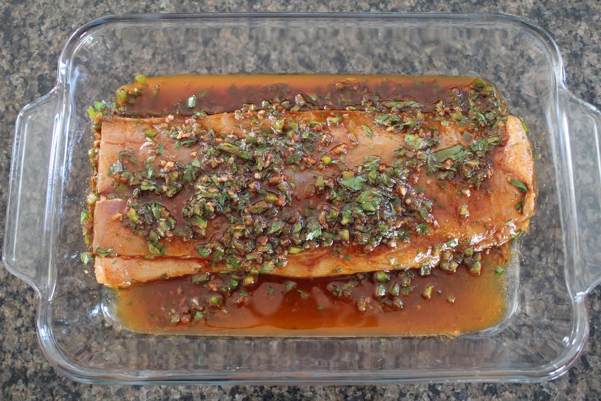 marinating fish in glass dish