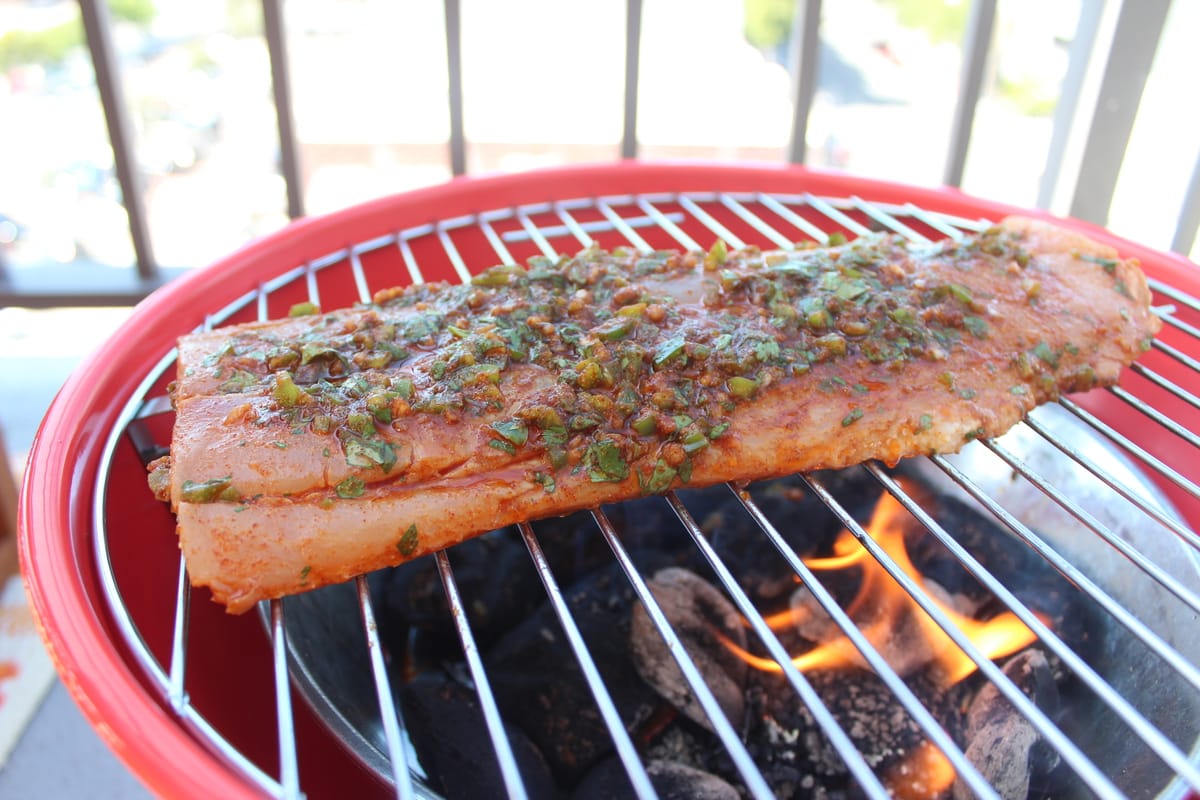 marinated filet of mahi mahi on grill