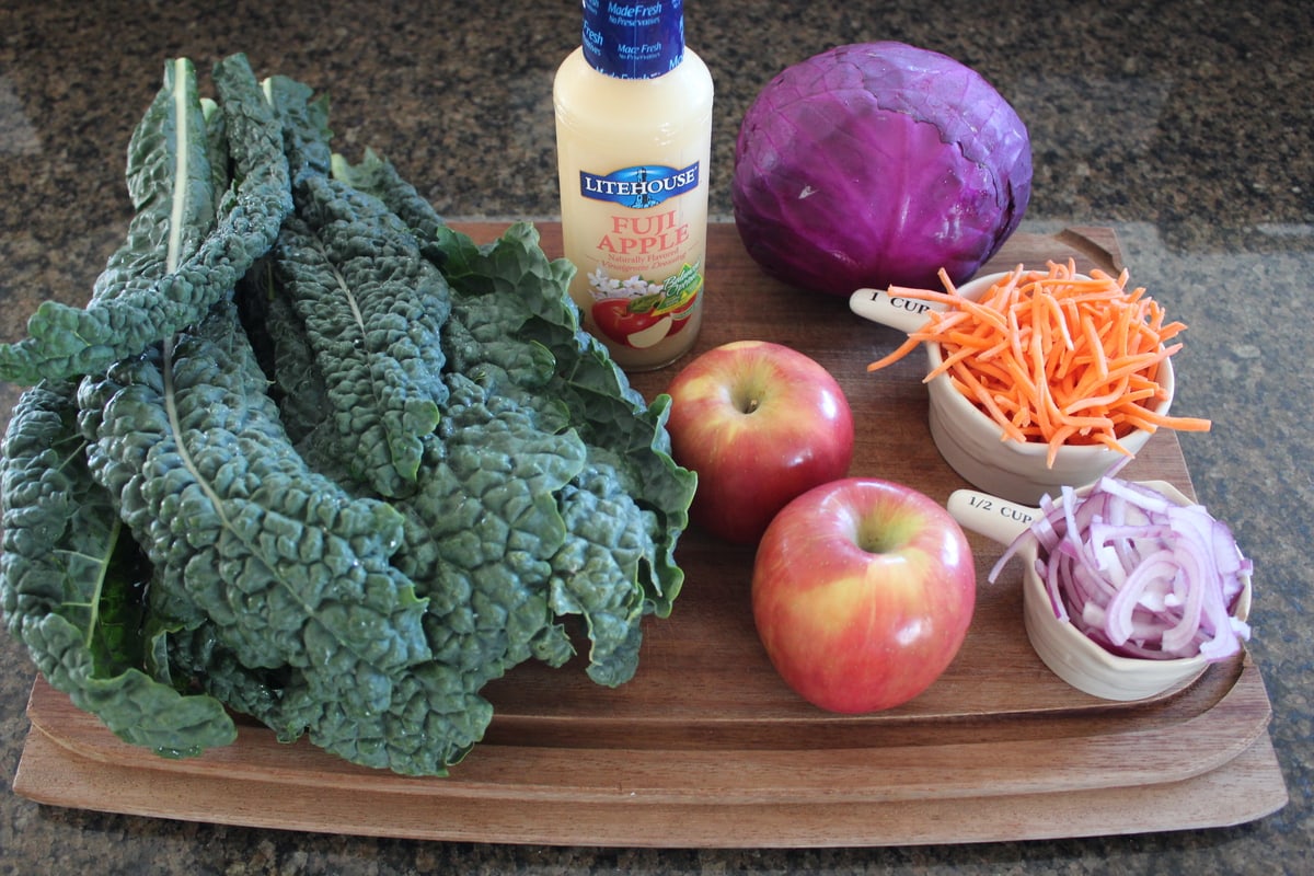 Kale Apple Slaw Ingredients on a wood board