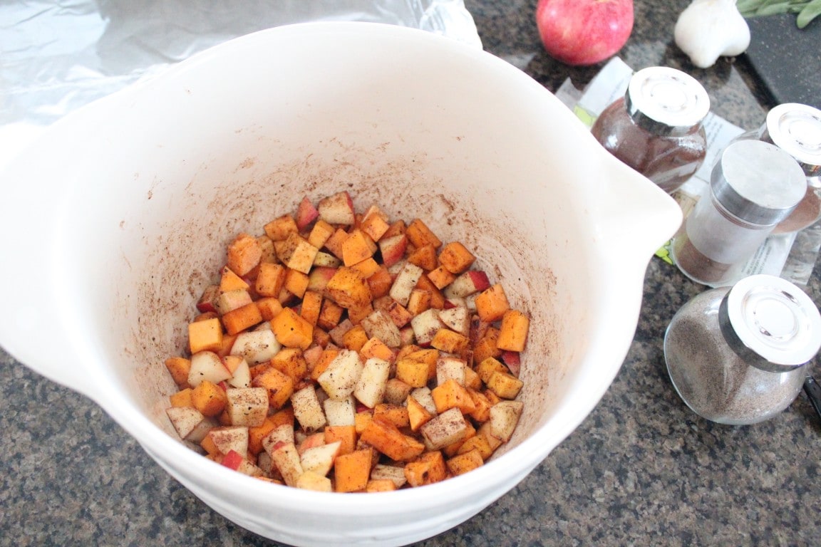 seasoned diced butternut squash and apples in large bowl